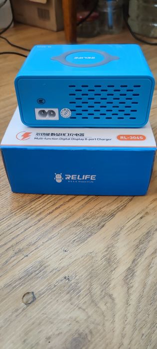 Швидкий зарядний пристрій + бездротове заряджання RELIFE RL-304S 4xUSB