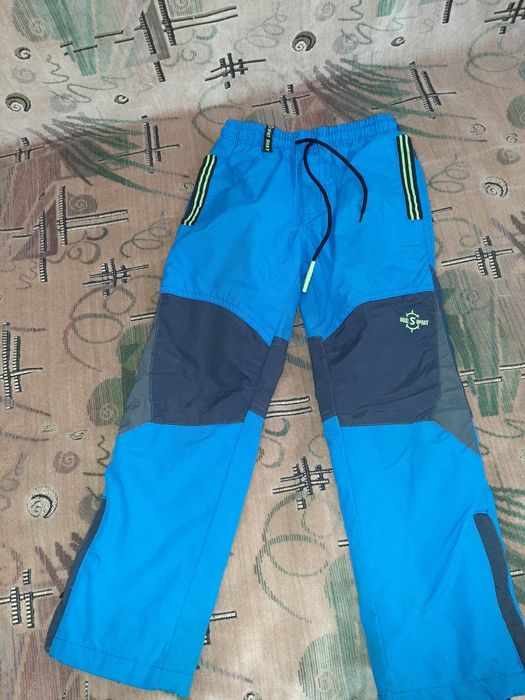 Зимові комбінезони.лижні штани