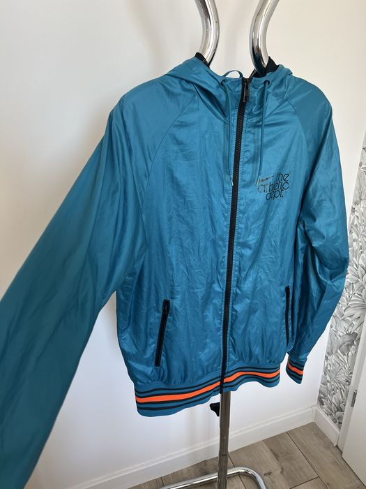 Kurtka Nike Athletic Dept wiatrówka sportowa turkusowa, rozmiar S