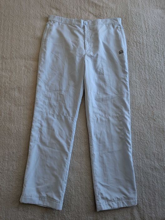 Niebieskie spodnie sportowe dresowe ortalionowe dresy Ellesse 38