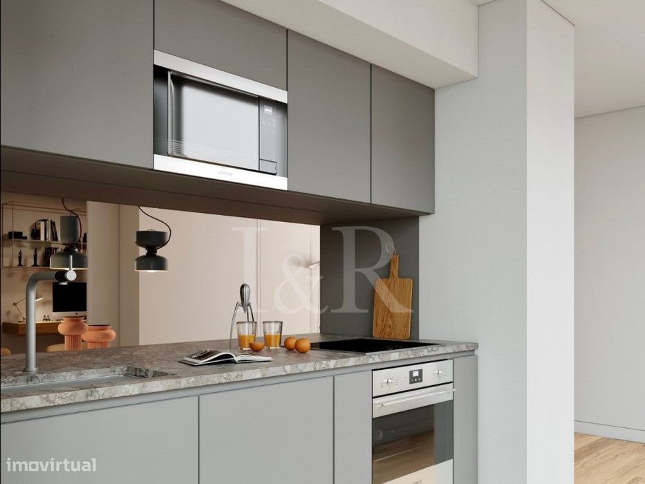 Apartamento T1 com vista rio e estacionamento, na Av. Infante Santo...