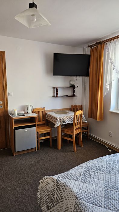 Pokoje i apartamenty z balkonami