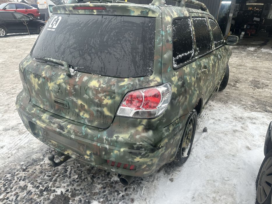 Miitsubishi  outlander 2.4 повний привід