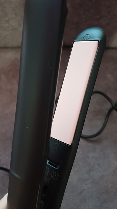 Вирівнювач для волосся