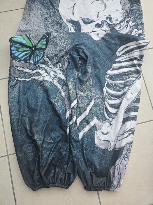 Ogrodniczki kościotrup i motyl
