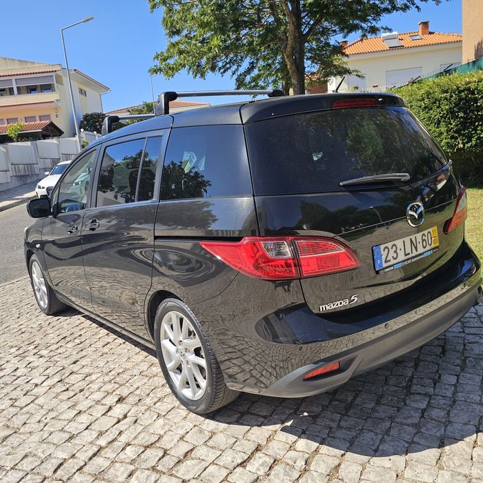 Vendo masda 5 de 2011 de 7 lugares com apenas 163 mil km esta rigorosamente impecável