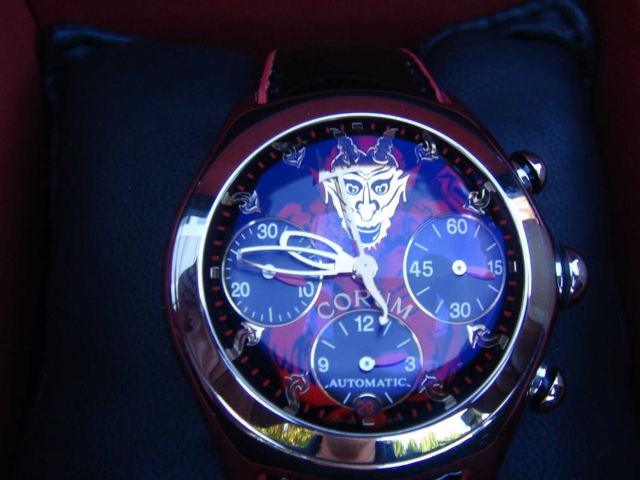 Часы Corum 