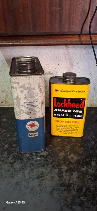 Latas antigas de lubrificantes