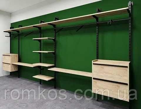 Настінне/пристінне торгове обладнання з металу  для магазинів одягу.