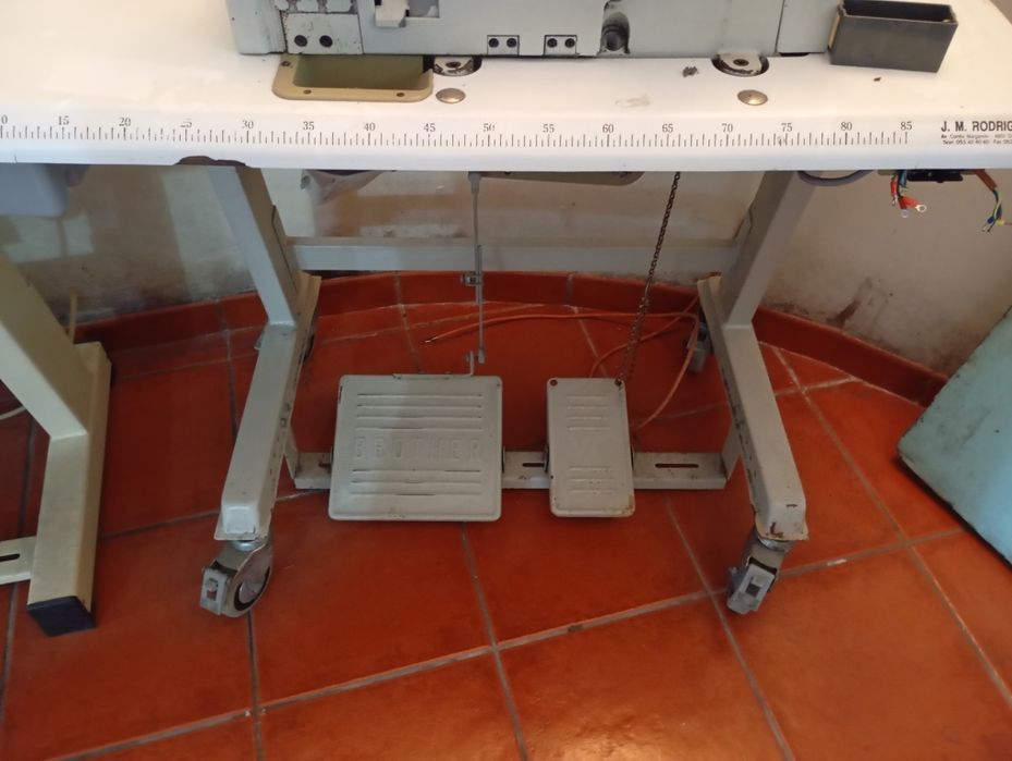 Máquina de recobrimento Brother