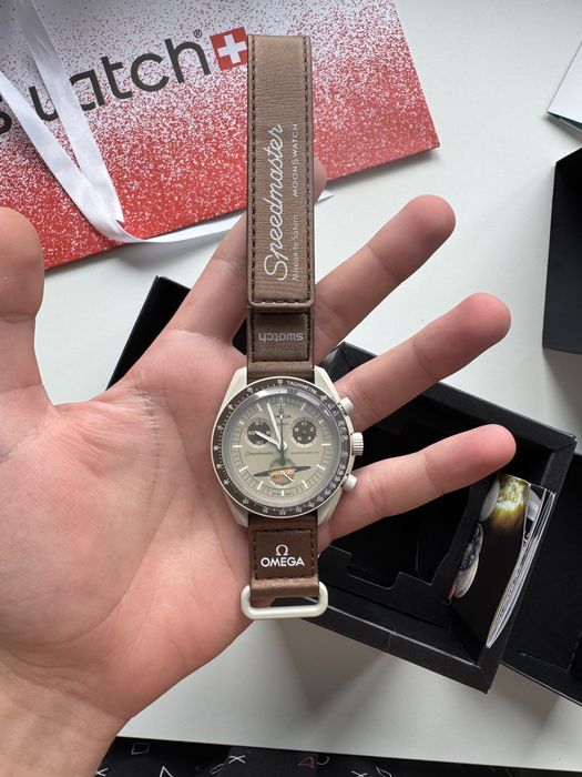 годинник Omega & Swatch