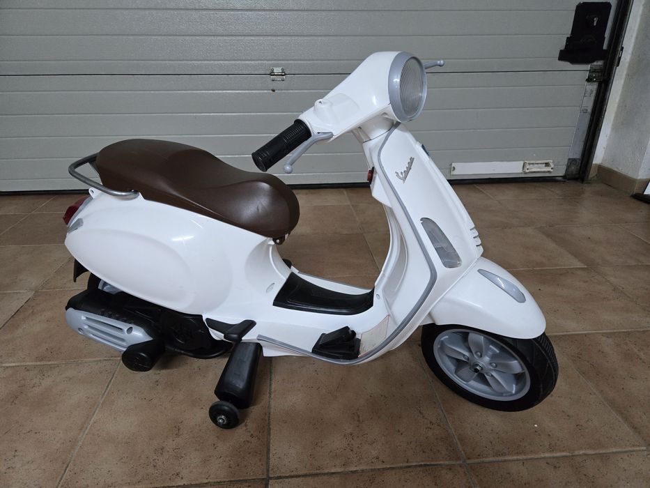 Mota eléctrica Vespa criança