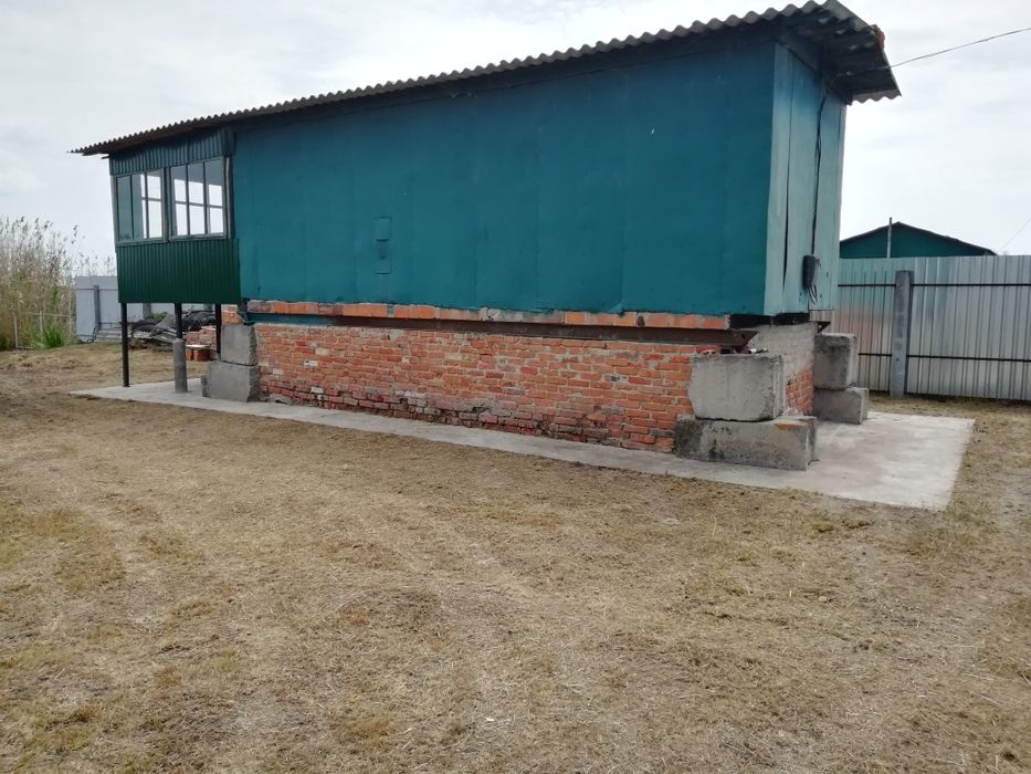 Продам  вагончик  на   березі  водосховища  поряд   р. С.ула.