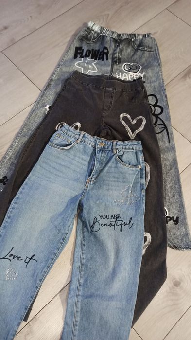 Spodnie jeansy 40 zł para 152