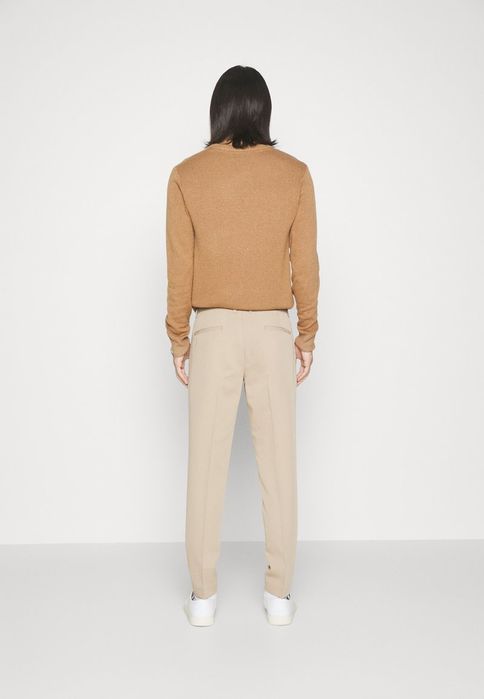 Spodnie chinosy beżowe Lindbergh M