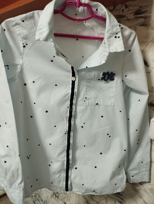 Блузка на дівчинку блакитна