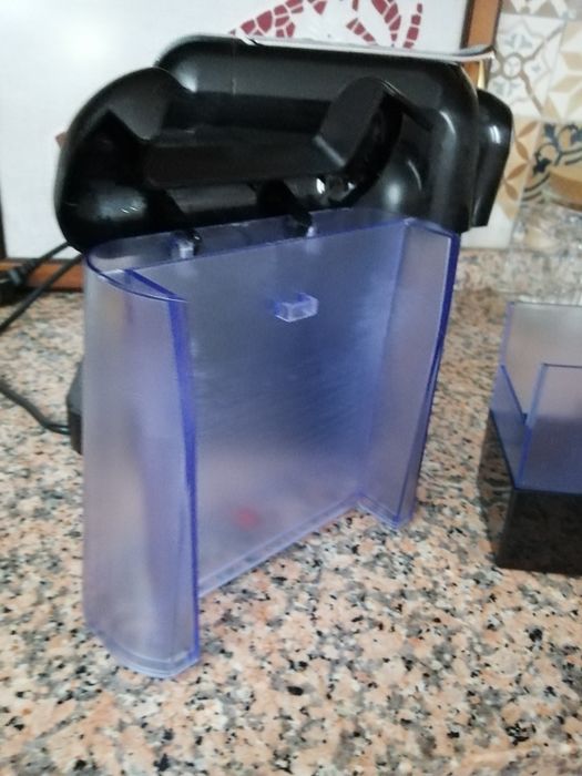 Máquina de café delta avariada