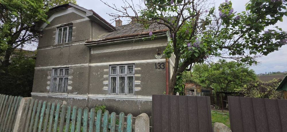 Земельна ділянка 10 с та два будинки. Любі державні програми