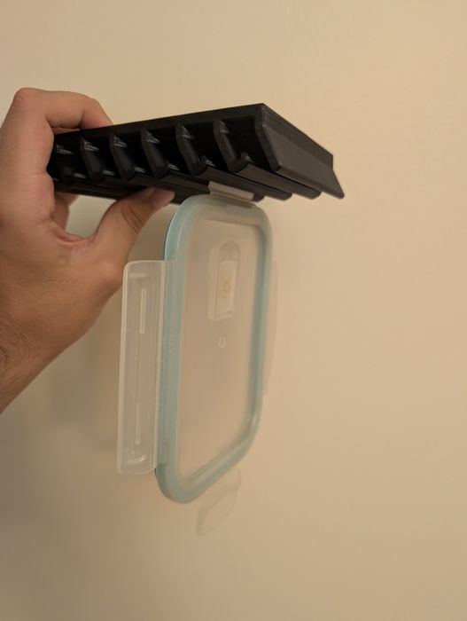 Suporte para tampas tupperware