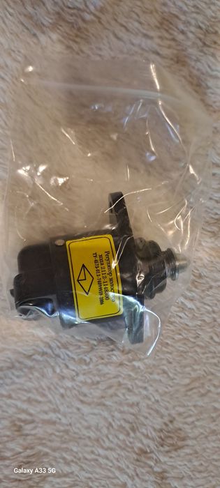 Маторчики, регулятор холостого ходу, кнопки склопідйомника ВАЗ 2112