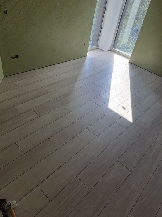 Укладка линолеума,  ковролина , заливка нивелир масса