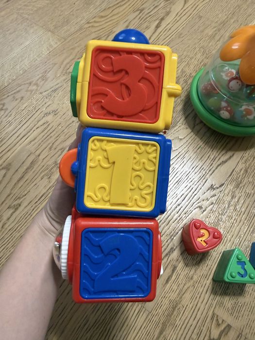 Набір іграшок горщик чарівний fisher price дзиґа chicco кубики