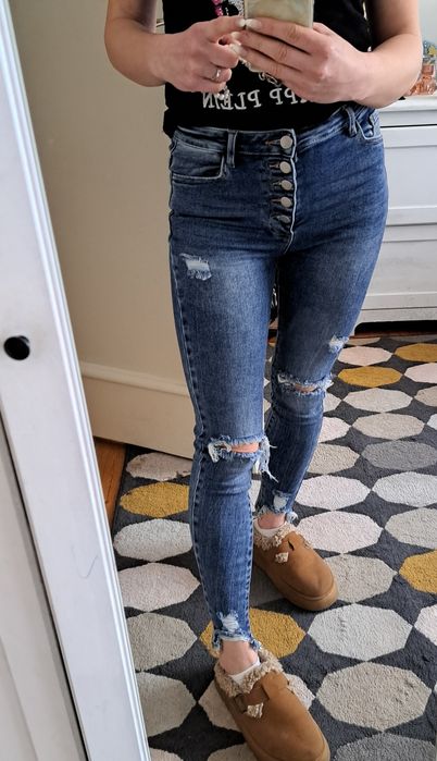 Dzinsy damskie dziury