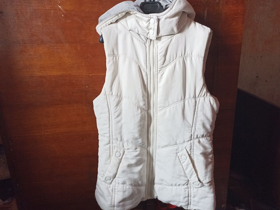 Продам женскую желетку