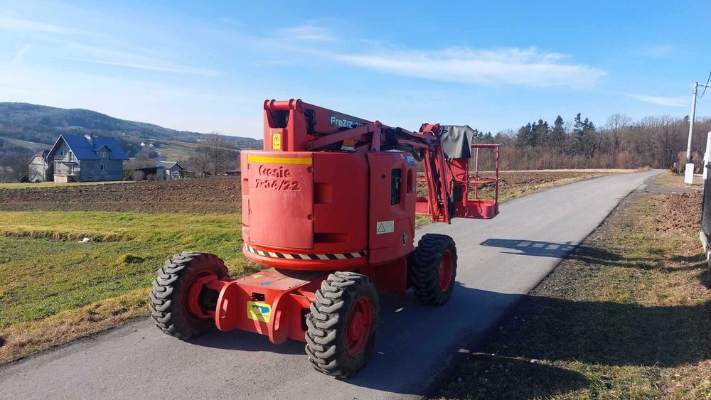 Wynajem podnośnik koszowy Genie Z34/22 wypożyczenie przegubowy zwyżka