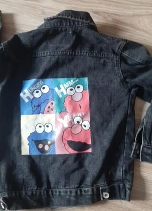 Джинсова куртка на дівчинку 128