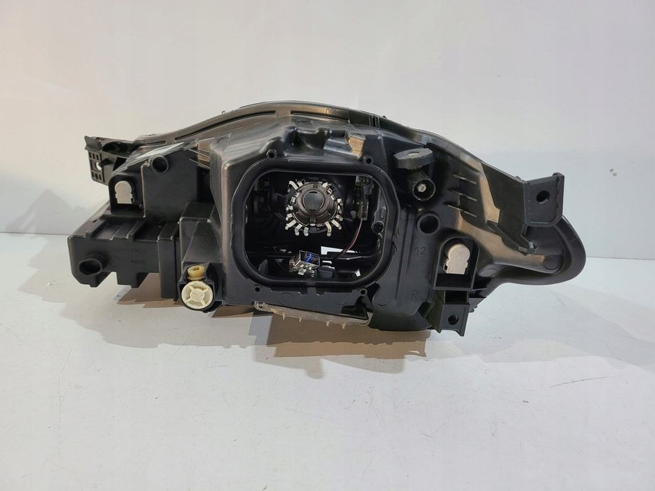 Jaguar XJ lampa przednia bi-xenon R 13440