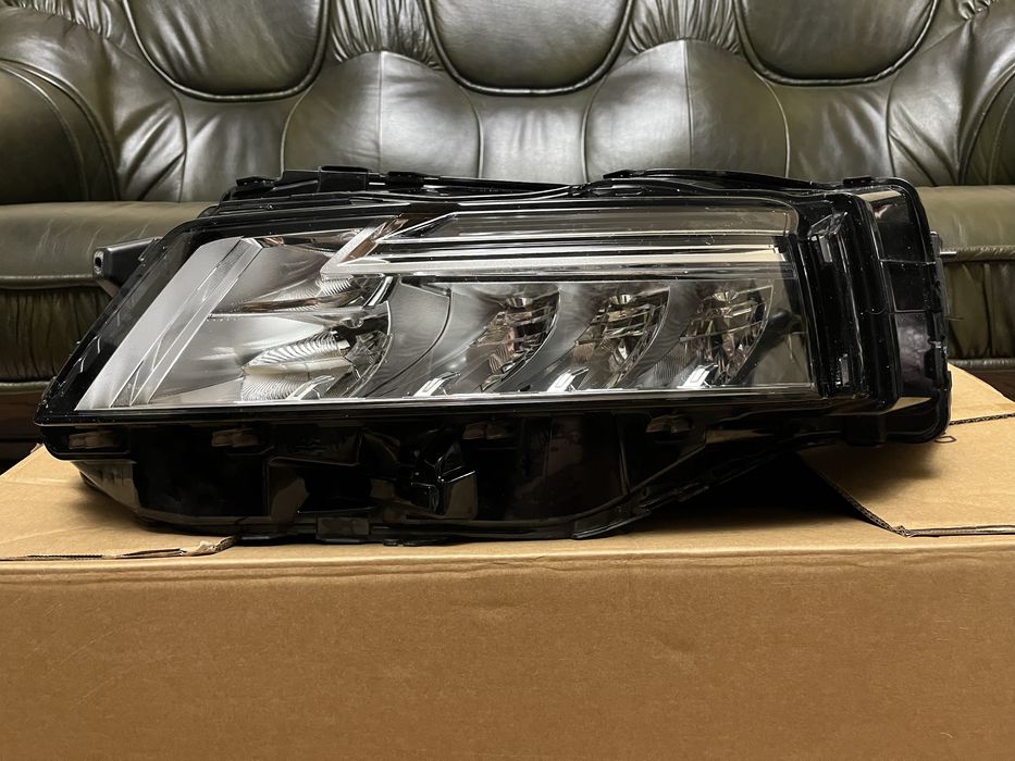 Орегінальна лампа ліва nissan rogue t33