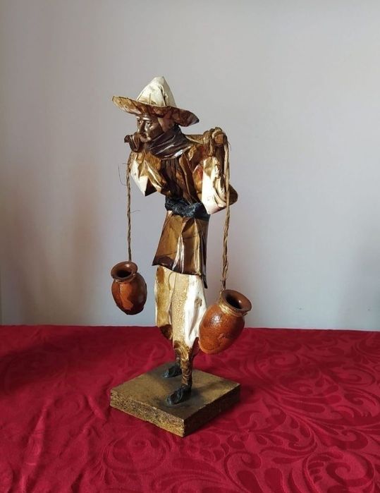 Escultura em papel marche