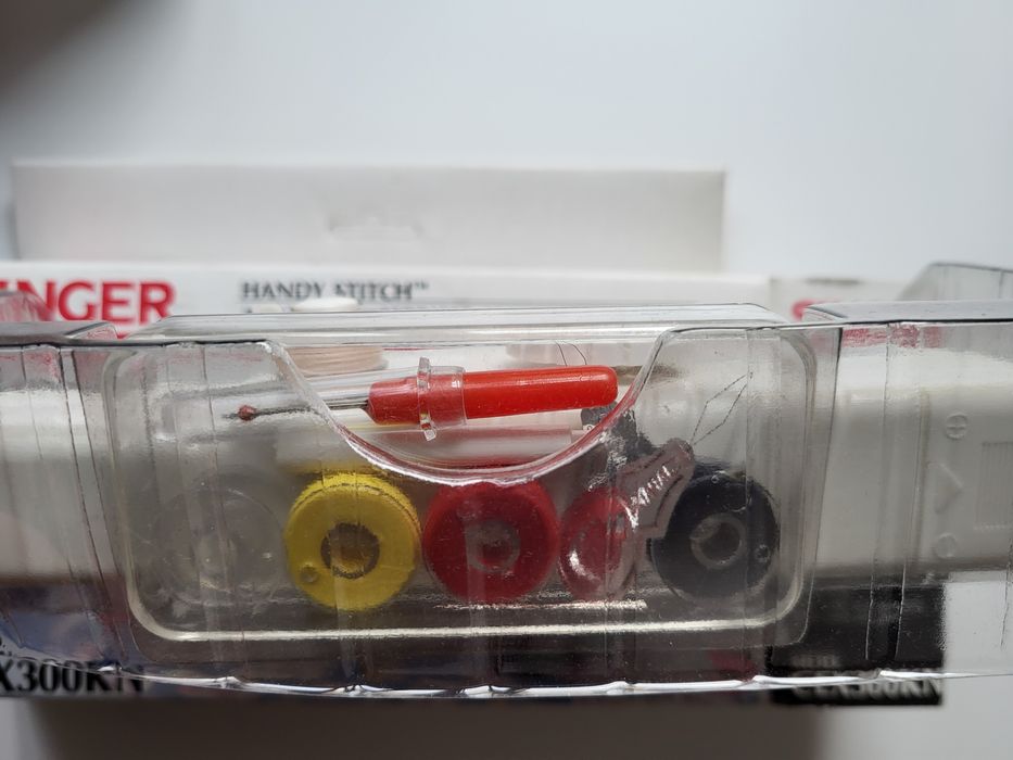 Máquina de costura portátil SINGER Handy Stitch, modelo CEX300kN