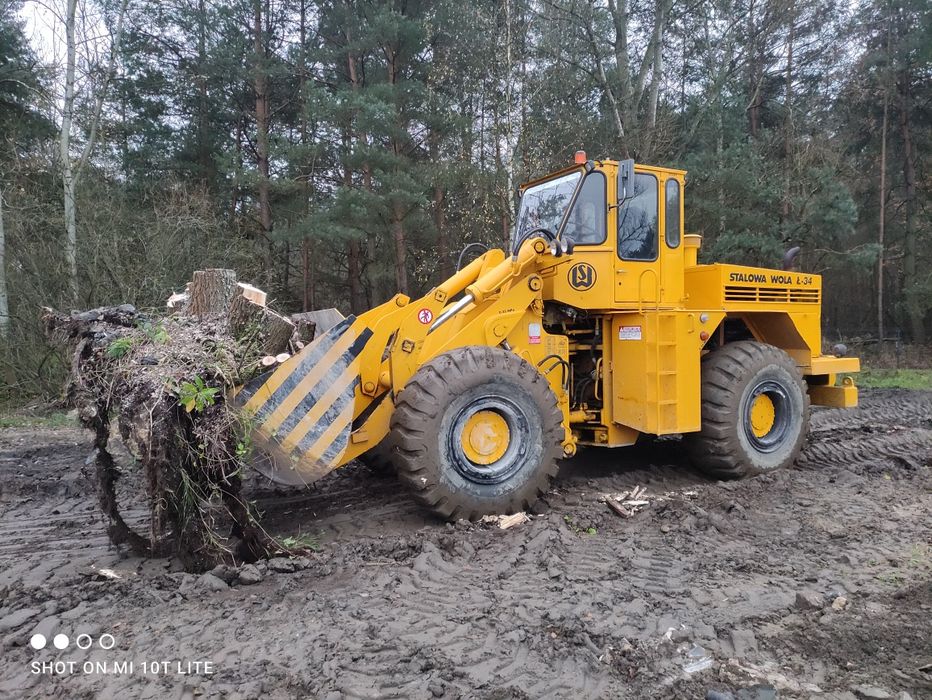 Usługi koparką obrotową i wywrotką transport koparko ładowarka
