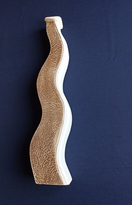 Wavy ceramic jug.64862790625026121