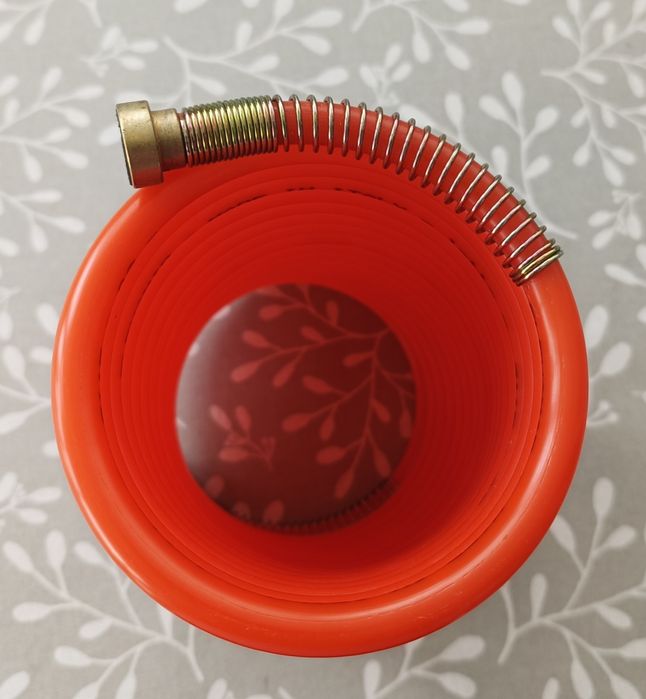 Mangueira laranja em espiral para ar comprimido