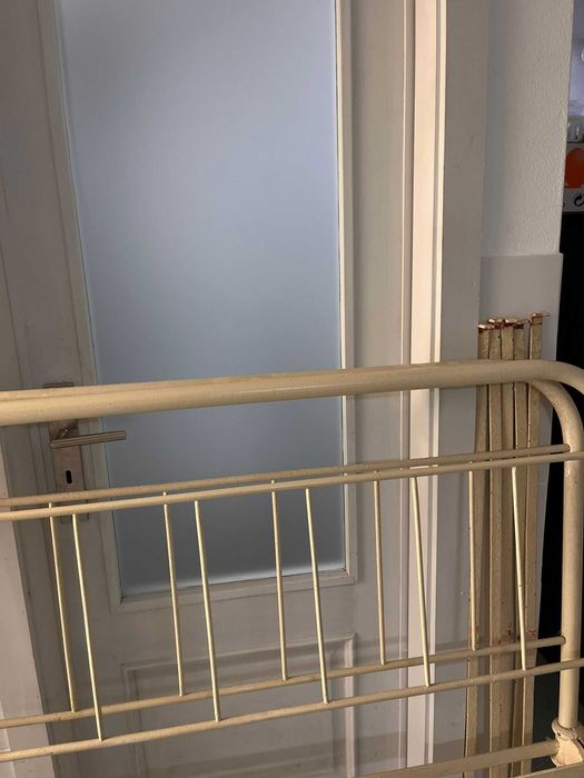 Cama de ferro antiga