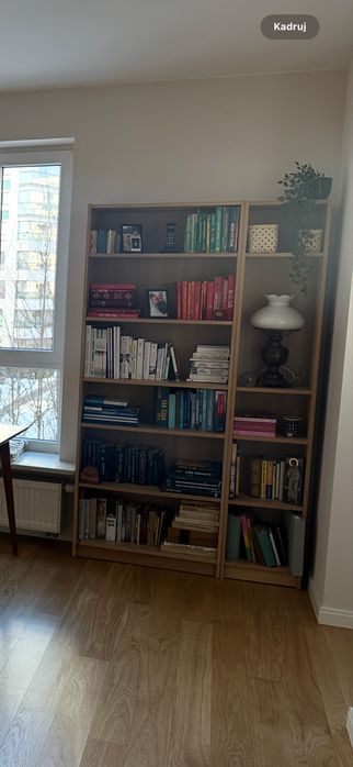 Regał billy - dwa. Jeden szeroki drugi wąski. Kolor drewno.