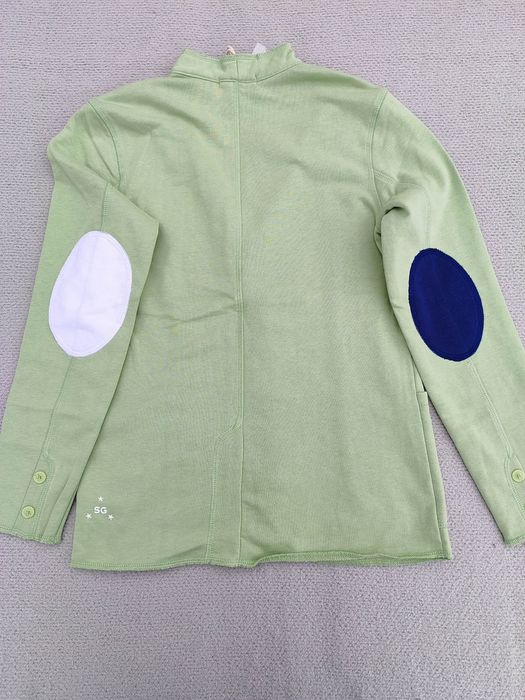 Піджаки, жилетки, кофтинки, гортайте фото