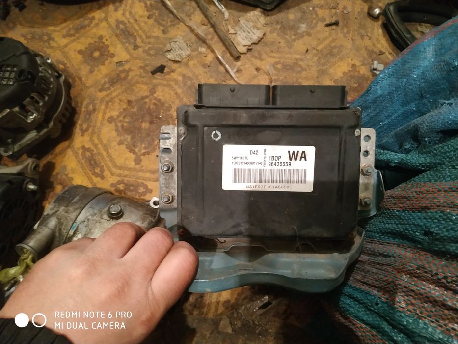 Chevrolet Aveo 04-11рік генератор 1.5