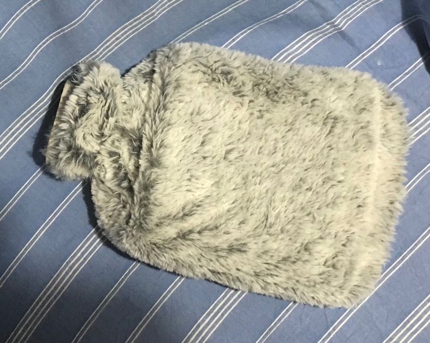 Botija de água quente com capa