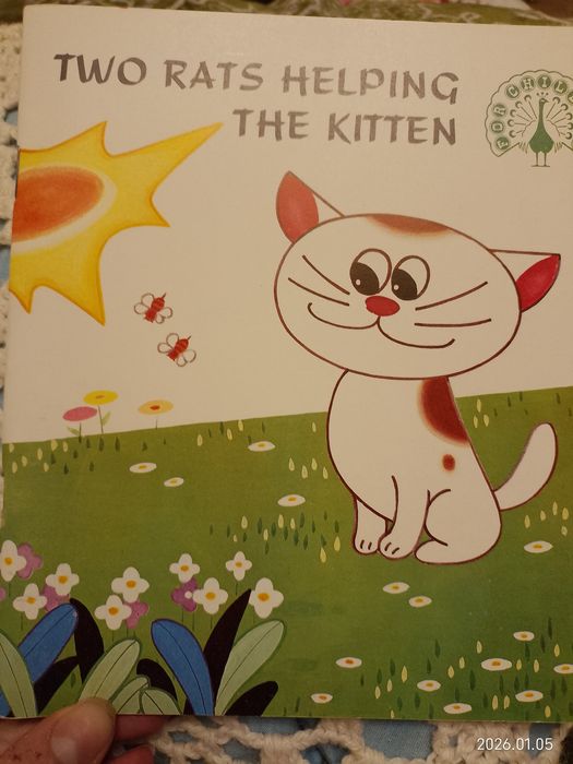 Two rats helping the kitten