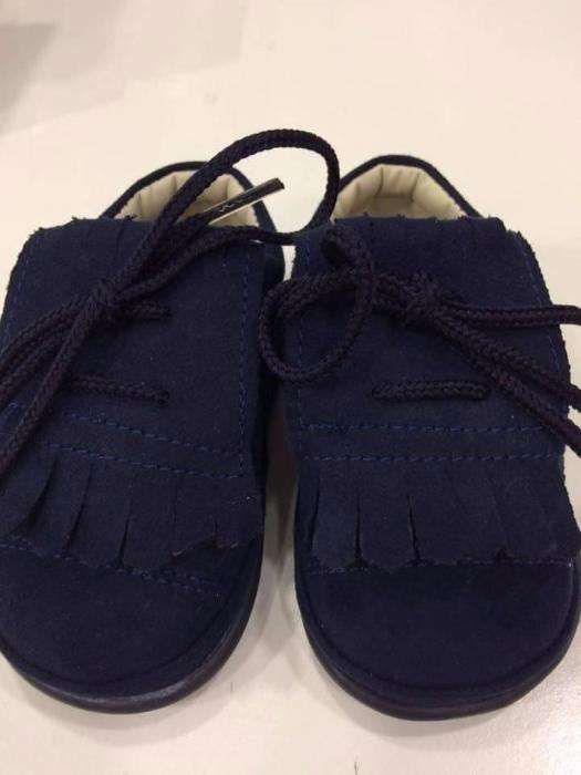 Sapatos de bebe com sola