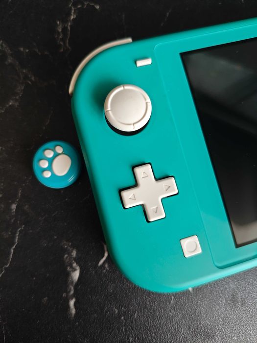 Konsola Nintendo Switch Lite + Etui + Nakładki