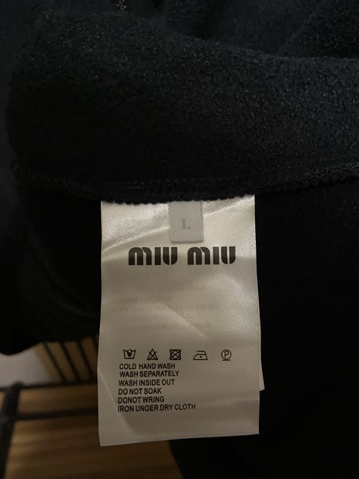 Фліска miu miu в наявності