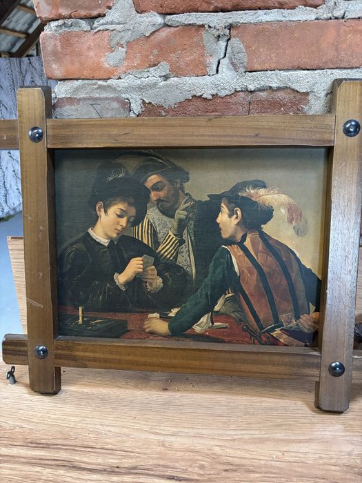 Obraz w drewnianej ramie .