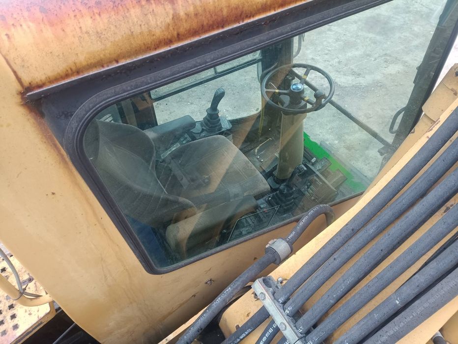 Екскаватор Caterpillar M312