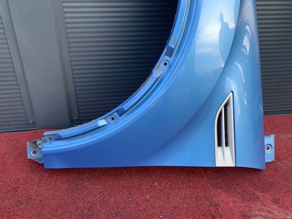 Ford Kuga MK1 błotnik lewy przedni przód niebieski