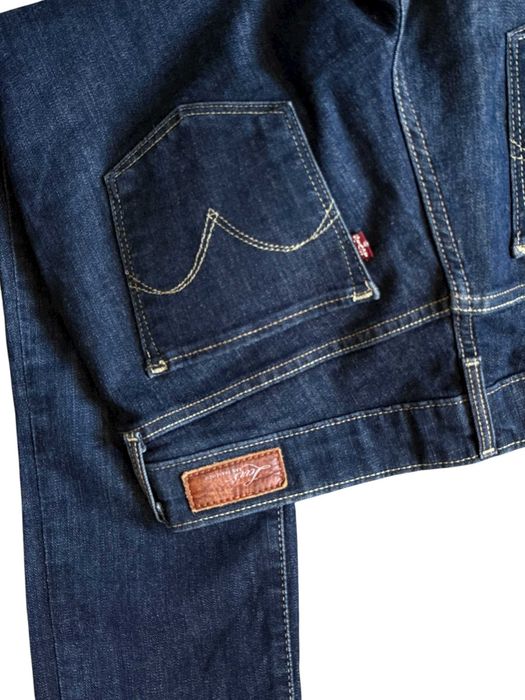 Stylowe damskie dżinsy  Levi's kultowy model Slight Curve W29 L32